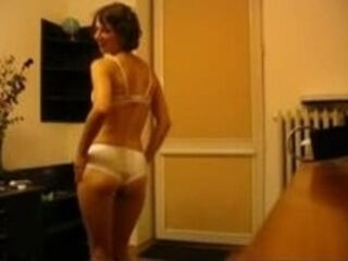 Hot mature wife stripping in bedroom
