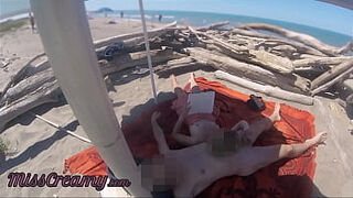 Risky Public Handjob on the Canary Beach Caught reading a book - MissCreamy