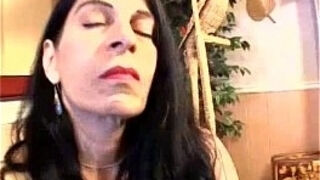 Hairy mature masturbates her pussy